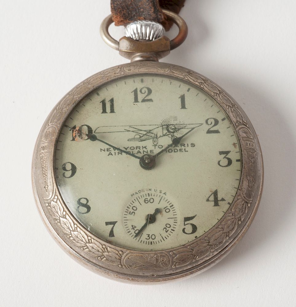 Appraisal: Lindbergh Pocket Watch and Fob Pocket watch and fob with