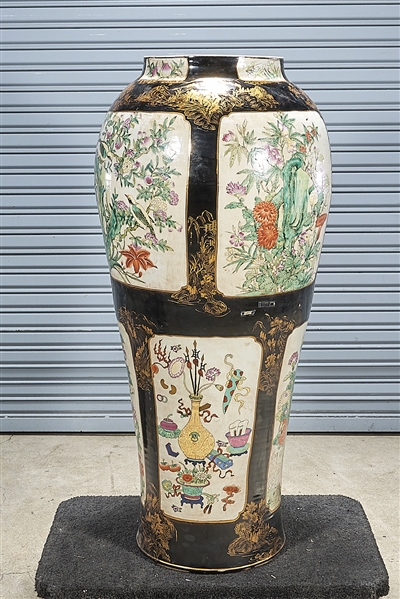 Appraisal: Tall Chinese enameled porcelain vase with scenes of flowers and