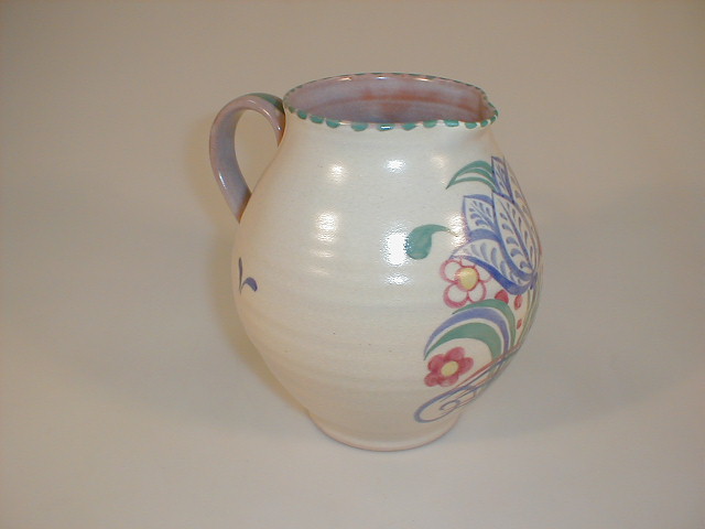 Appraisal: A Carter Stabler Adams Poole pot bellied jug decorated with