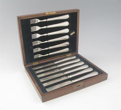 Appraisal: A Victorian cased set of six pairs of engraved dessert