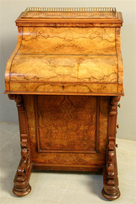 Appraisal: Victorian walnut harlequin Davenport with galleried rising stationery compartment fitted