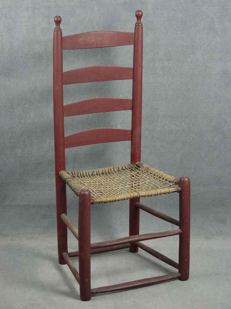 Appraisal: CHAIR - Early country ladder back side chair in old