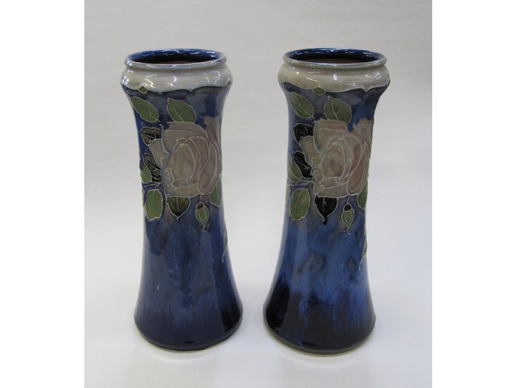 Appraisal: Pair of Royal Doulton stoneware vases with tubelined decoration of