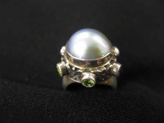 Appraisal: Silver Grey Pearl Ring with Peridoton sides in sterling silver