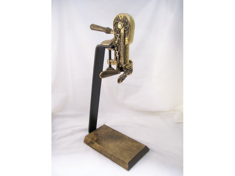 Appraisal: Countertop Wine Opener Heavy decorated brass opener on hardwood stand