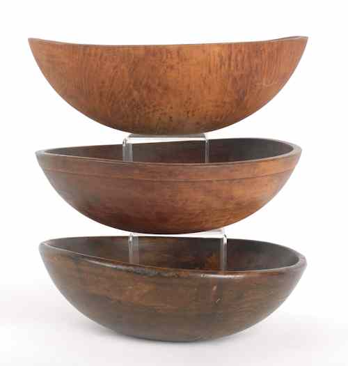 Appraisal: Three large turned wood bowls largest - h dia