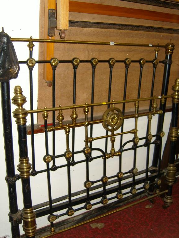 Appraisal: A Victorian brass and iron ' bedstead with polished brass