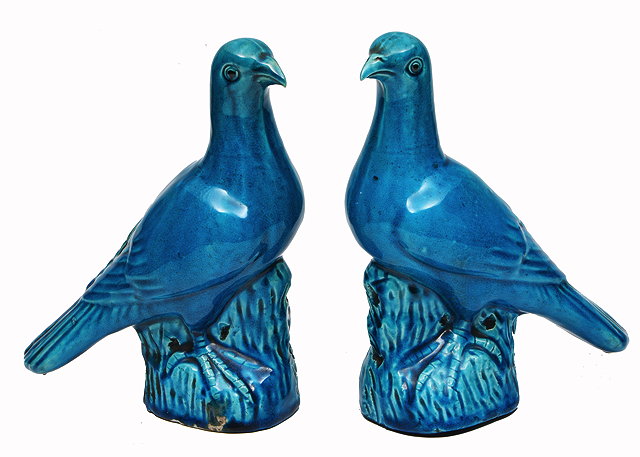 Appraisal: A PAIR OF TH CENTURY CHINESE BLUE GLAZED STONEWARE DOVES