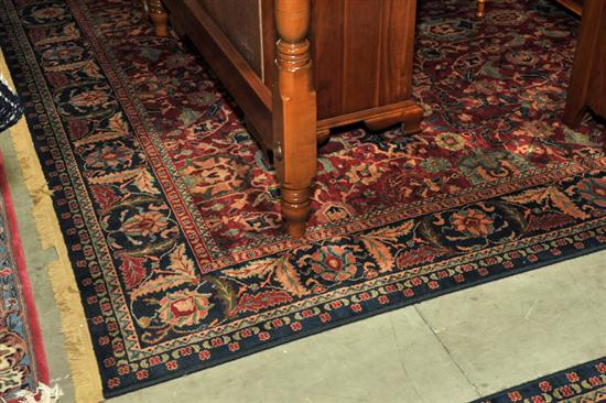 Appraisal: A PAIR OF ORIENTAL STYLE RUGS Nearly identical pair of