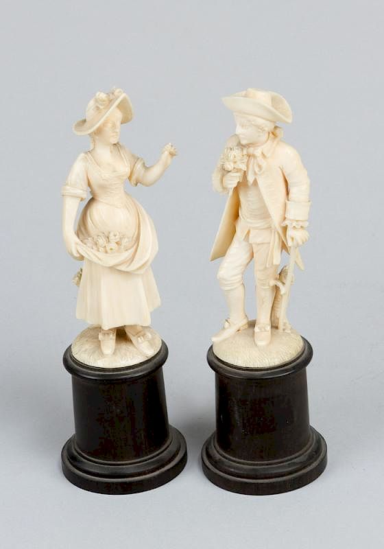 Appraisal: Pair of Ivory Sculptures Pair of Ivory Sculptures of a