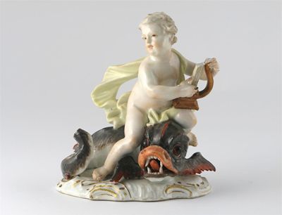 Appraisal: A Meissen group of a putto riding a dolphin holding