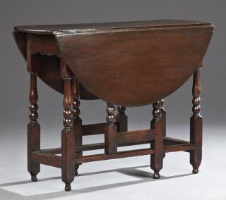 Appraisal: English Carved Oak Drop Leaf Dining Table c English Carved