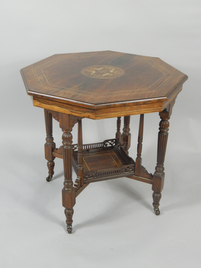 Appraisal: A Victorian rosewood octagonal occasional table with inlaid ivory and