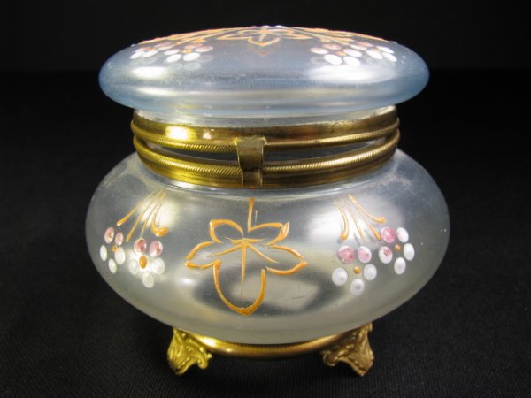 Appraisal: Antique opalescent and enameled glass footed powder jar with brass