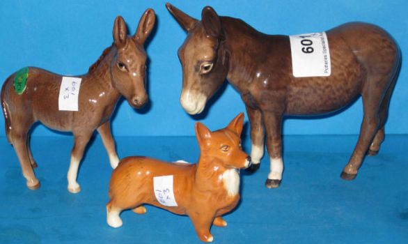 Appraisal: Beswick Donkey B Donkey Foal And Small Corgi