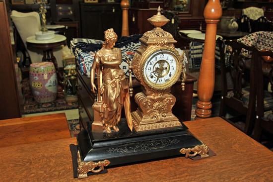 Appraisal: ANSONIA FIGURAL MANTLE CLOCK The Muse of Music standing next