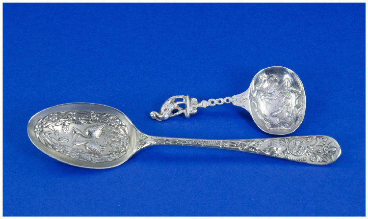 Appraisal: Two Stork Spoons Nineteenth Century Aesthetic Period Spoon The bowl