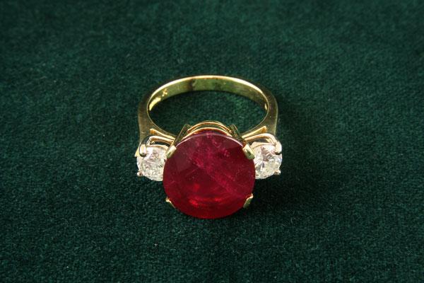 Appraisal: A Ruby and Diamond Ring claw-set large oval ruby approximately