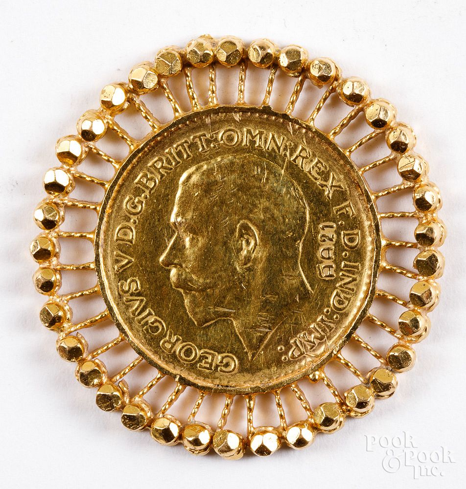 Appraisal: George V gold sovereign mounted in a pendan George V