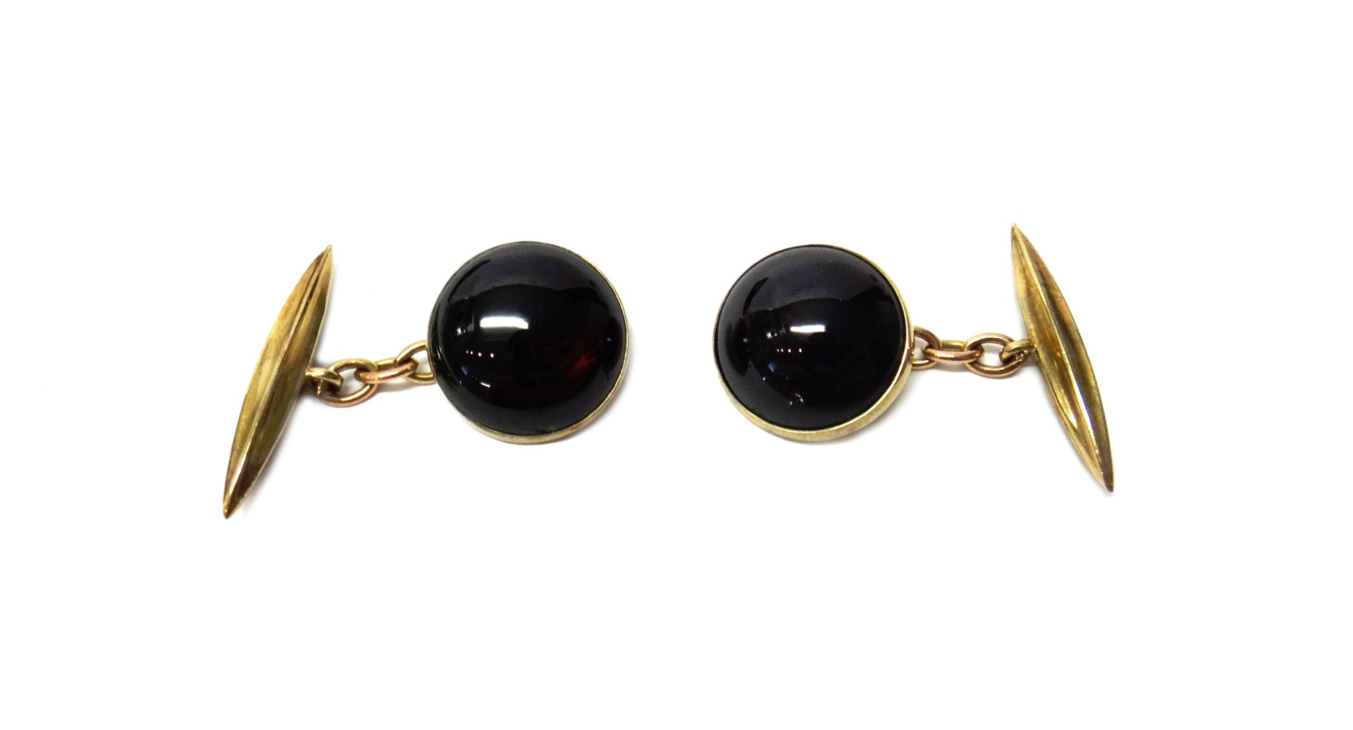 Appraisal: A pair of ct gold cufflinks set with circular cabochon