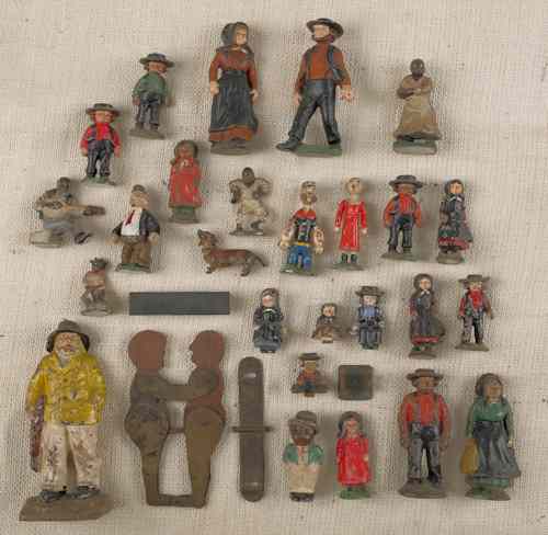 Appraisal: Large collection of painted cast iron figures th c to