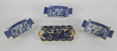 Appraisal: Three Staffordshire rectangular two-handled dishes transfer printed willow pattern scenes