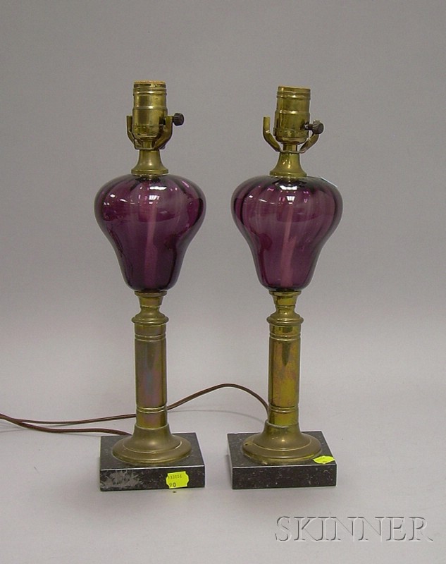 Appraisal: Pair of Amethyst Glass Oil Lamps with Brass and Marble