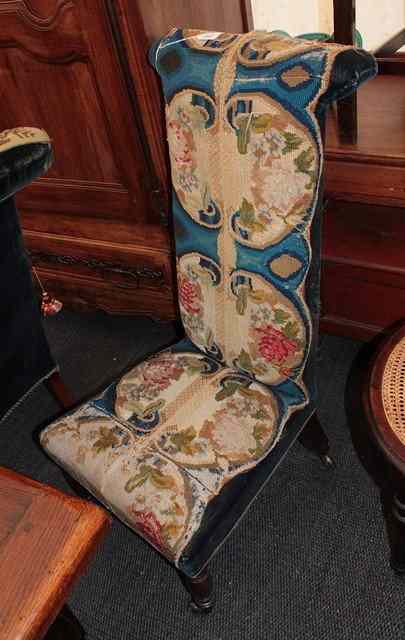 Appraisal: A VICTORIAN PRIE DIEU CHAIR with high back upholstered in