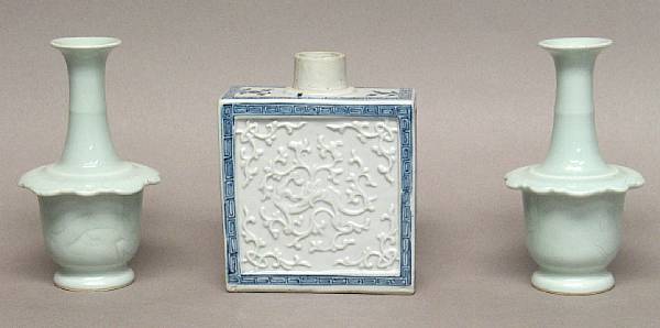 Appraisal: Three porcelain containers Including a blue and white rectangular tea