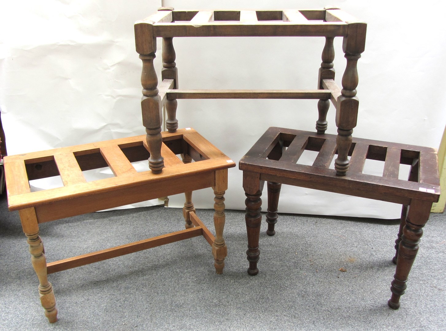 Appraisal: A th century walnut slatted luggage stand on turned supports