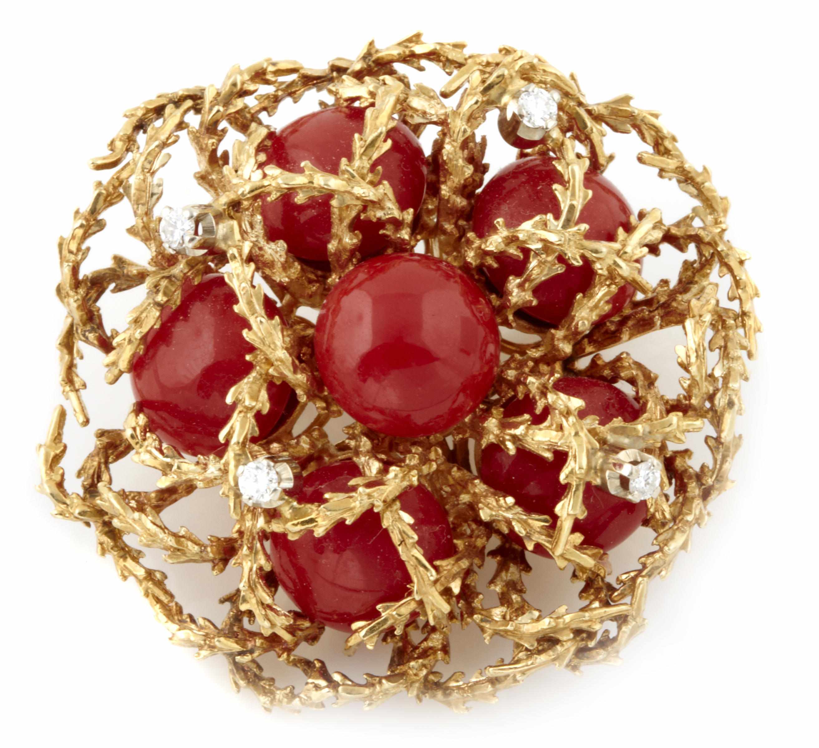 Appraisal: A coral diamond and eighteen karat gold brooch measuring x