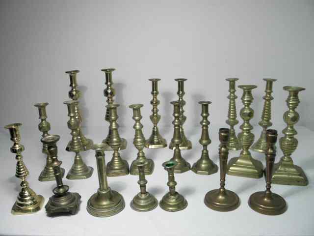 Appraisal: Lot of assorted early brass candle sticks and taper sticks