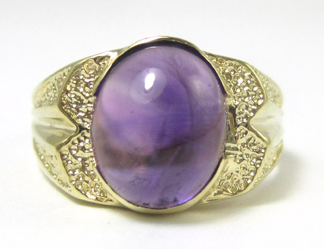 Appraisal: AMETHYST AND FOURTEEN KARAT GOLD RING set with a single