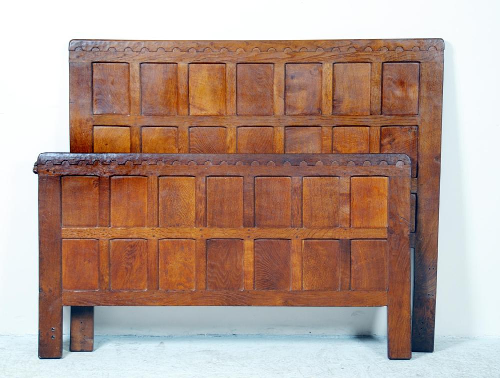 Appraisal: AN ADZED OAK BEDSTEAD by Robert Mouseman Thompson 's of