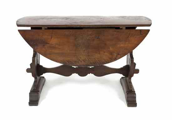 Appraisal: A Continental Walnut Drop-Leaf Pub Table the rectangular top with