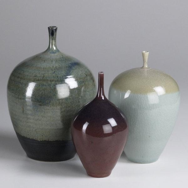 Appraisal: STEPHEN MERRITT Three stoneware bottle-shaped vases One with artist s