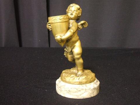 Appraisal: FRENCH GILT-BRONZE PUTTO The outstretched arms holding the base of