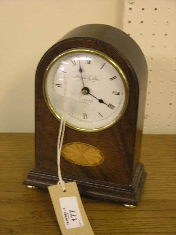 Appraisal: A reproduction inlaid mahogany mantel clock convex enamel dial quartz