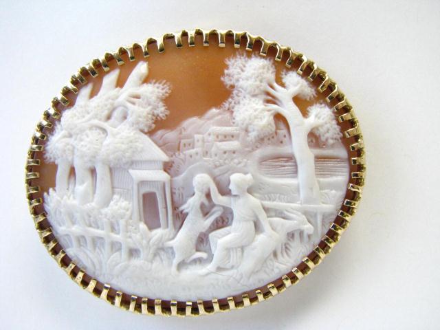 Appraisal: Yellow Gold oval antique carved-stone cameo brooch