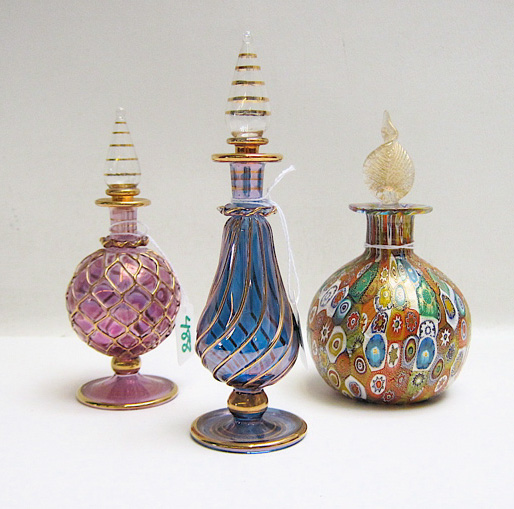 Appraisal: THREE GLASS FRAGRANCE BOTTLES the first in a millefiori pattern