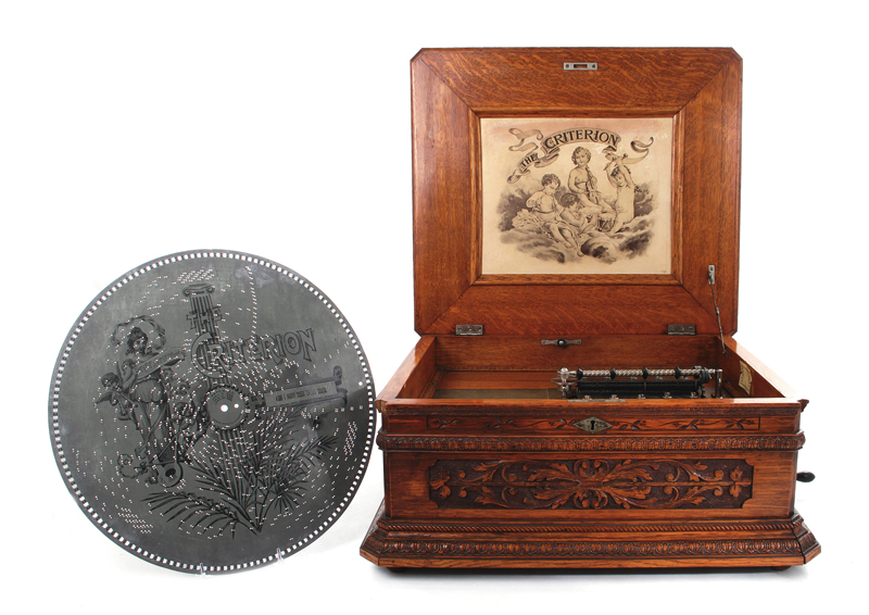 Appraisal: Criterion carved oak double comb disc music box circa -