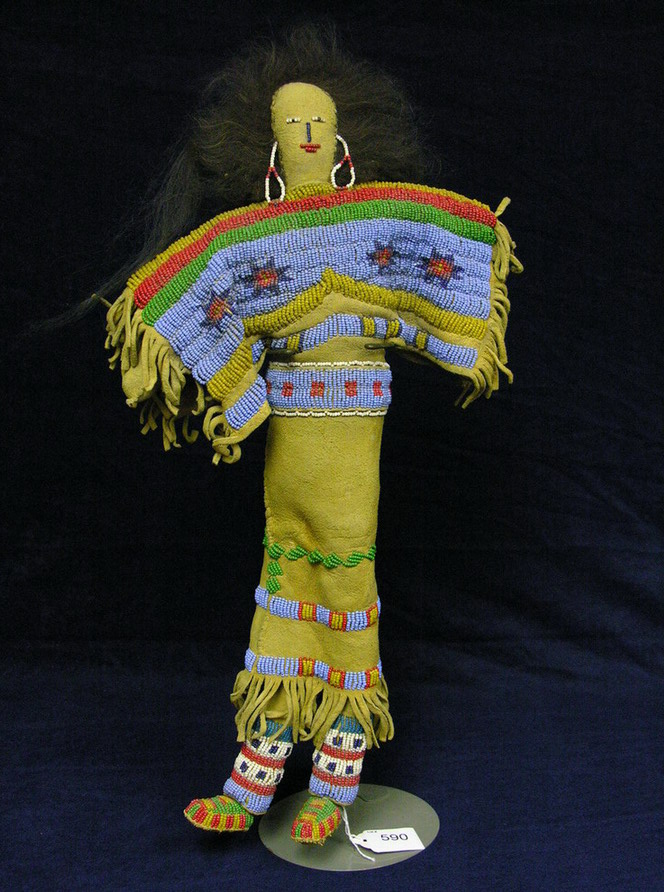 Appraisal: NATIVE AMERICAN BEADED LEATHER DOLL ANIMAL HAIR Brain tanned leather