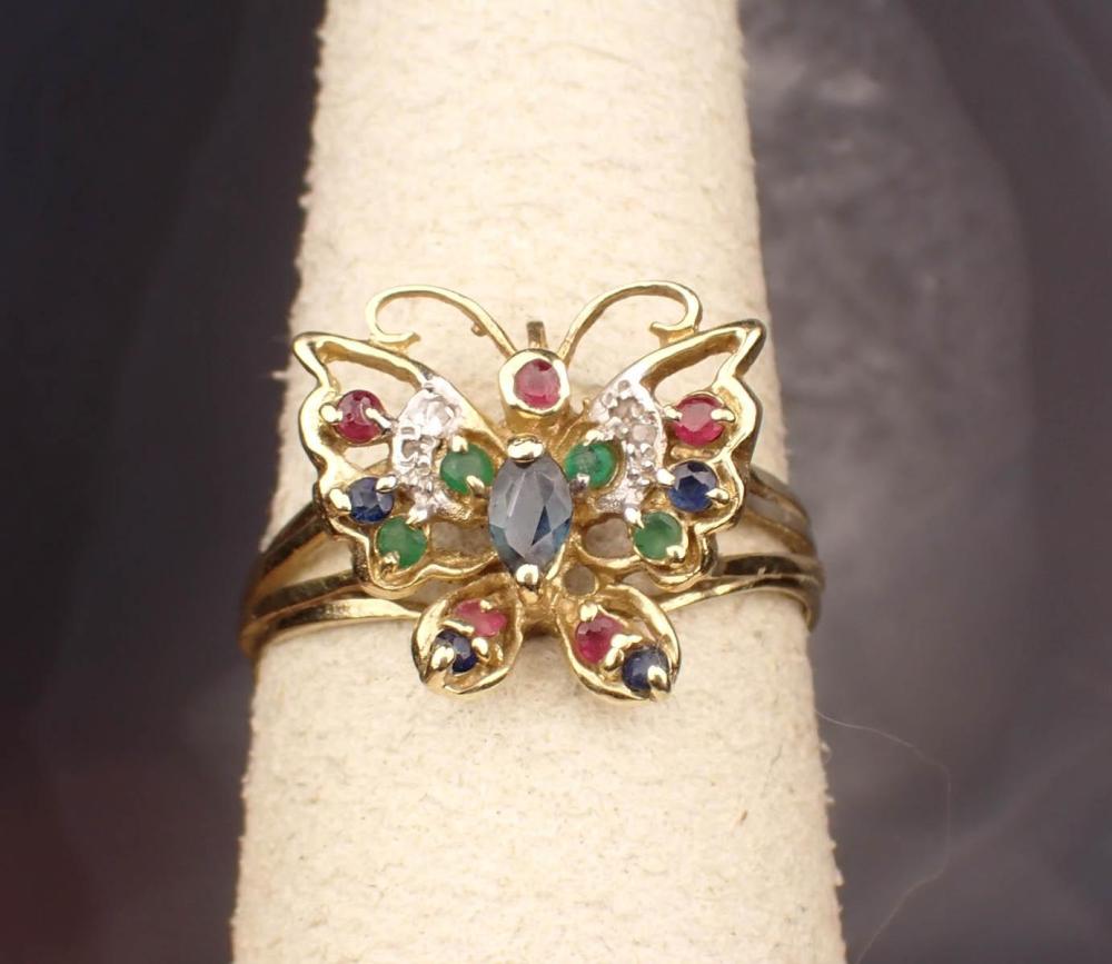 Appraisal: FOURTEEN KARAT GOLD RING WITH PRECIOUS GEMSTONES The yellow and