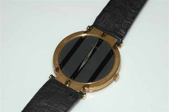 Appraisal: A PIAGET QUARTZ WRISTWATCH WITH A GREY AND BLACK TWO