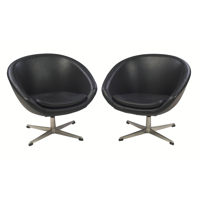 Appraisal: Overman swiveling lounge chairs pair