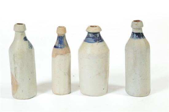 Appraisal: FOUR STONEWARE BOTTLES American nd half- th century Three are