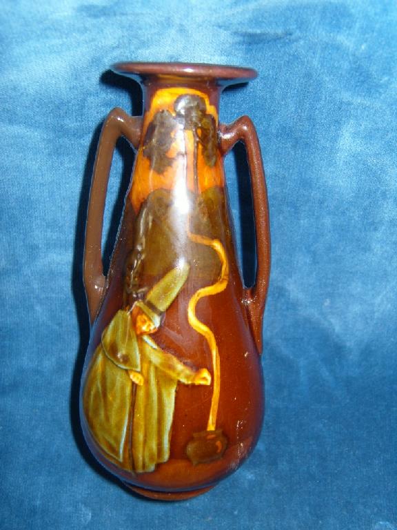 Appraisal: A Royal Doulton -handled Kings ware vase with painted decoration