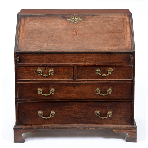 Appraisal: A George III mahogany bureau with stepped and fitted interior