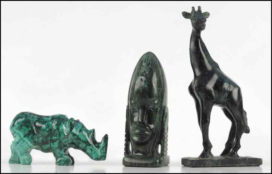 Appraisal: CARVED MALACHITE TRIBAL HEAD Together with two stone animals Head