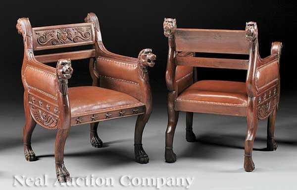 Appraisal: A Pair of Empire-Style Carved Walnut Armchairs probably Baltic or